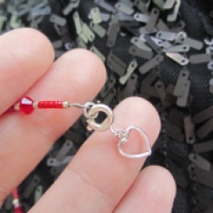 Dreaming of a matching bracelet? Your wish is my command! Attach a heart tab hook up clasp to the end of a 7" delicate style crystal insert strand (pomegranate).